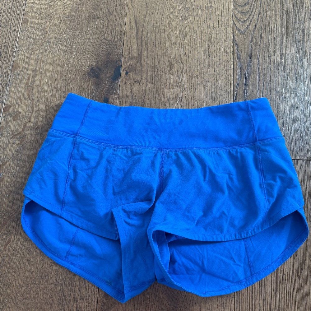 Lululemon speed up shorts with 2.5 inch inseam and in blue